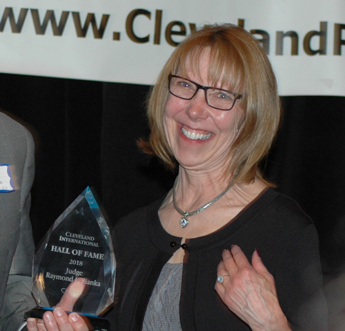 Karen Pianka accepts the Cleveland International Hall of Fame induction award for her late husband Judge Ray Pianka